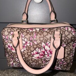 DKNY Bryant Park satchel in pink and brown coated canvas with a floral print